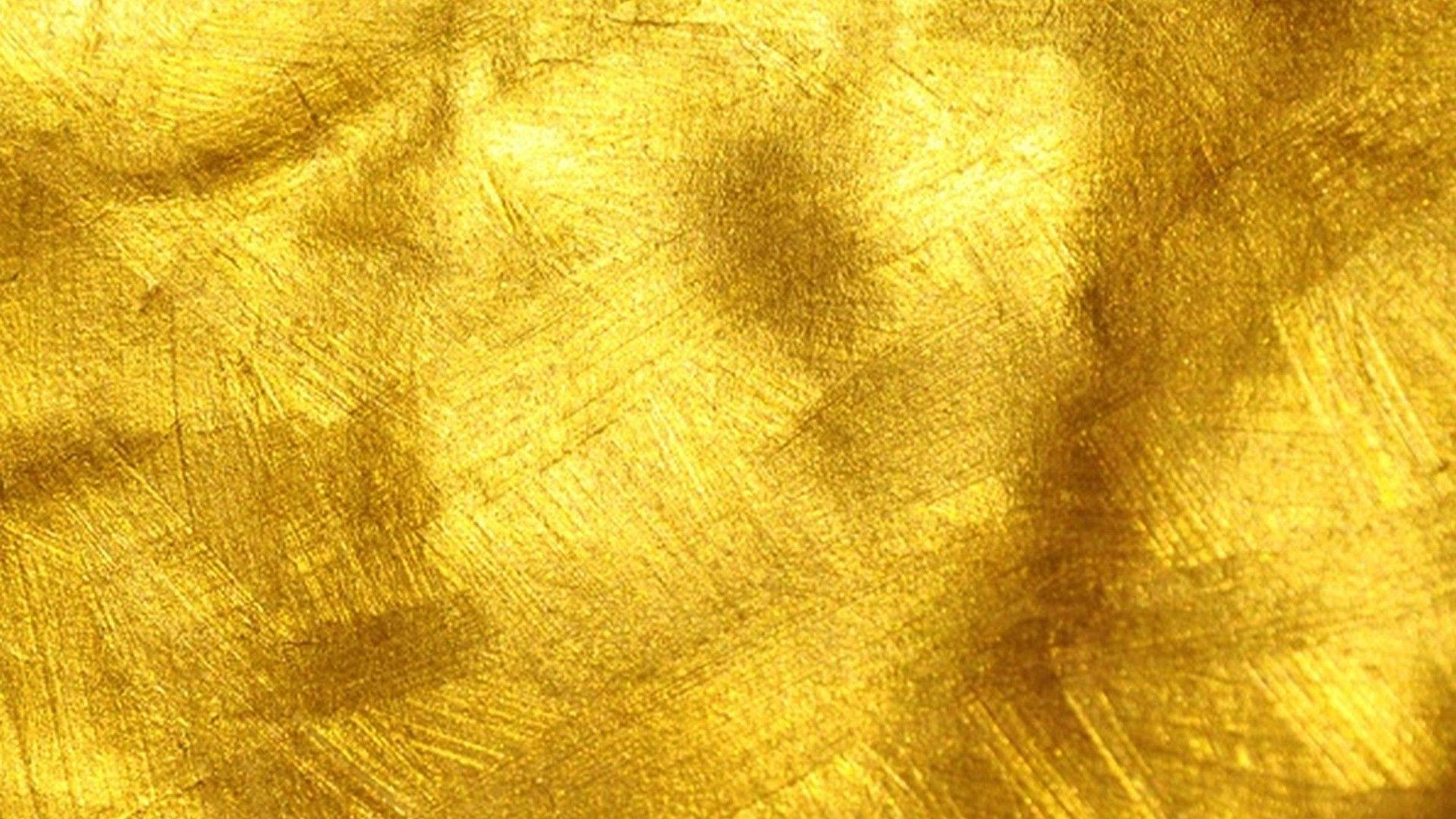 Plain Gold Painting With Brush Strokes Wallpaper