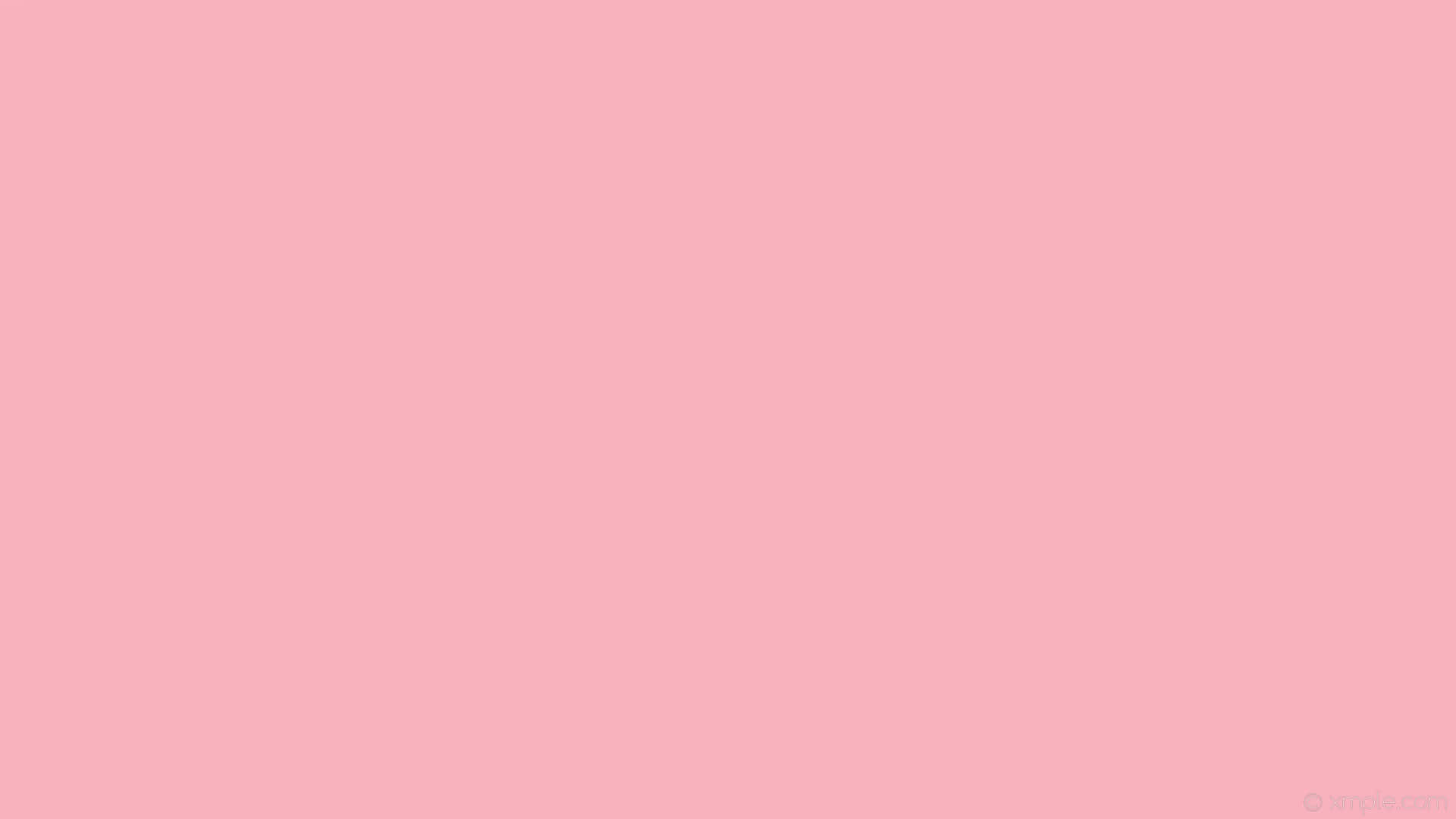 Plain pink desktop with a white chair Wallpaper