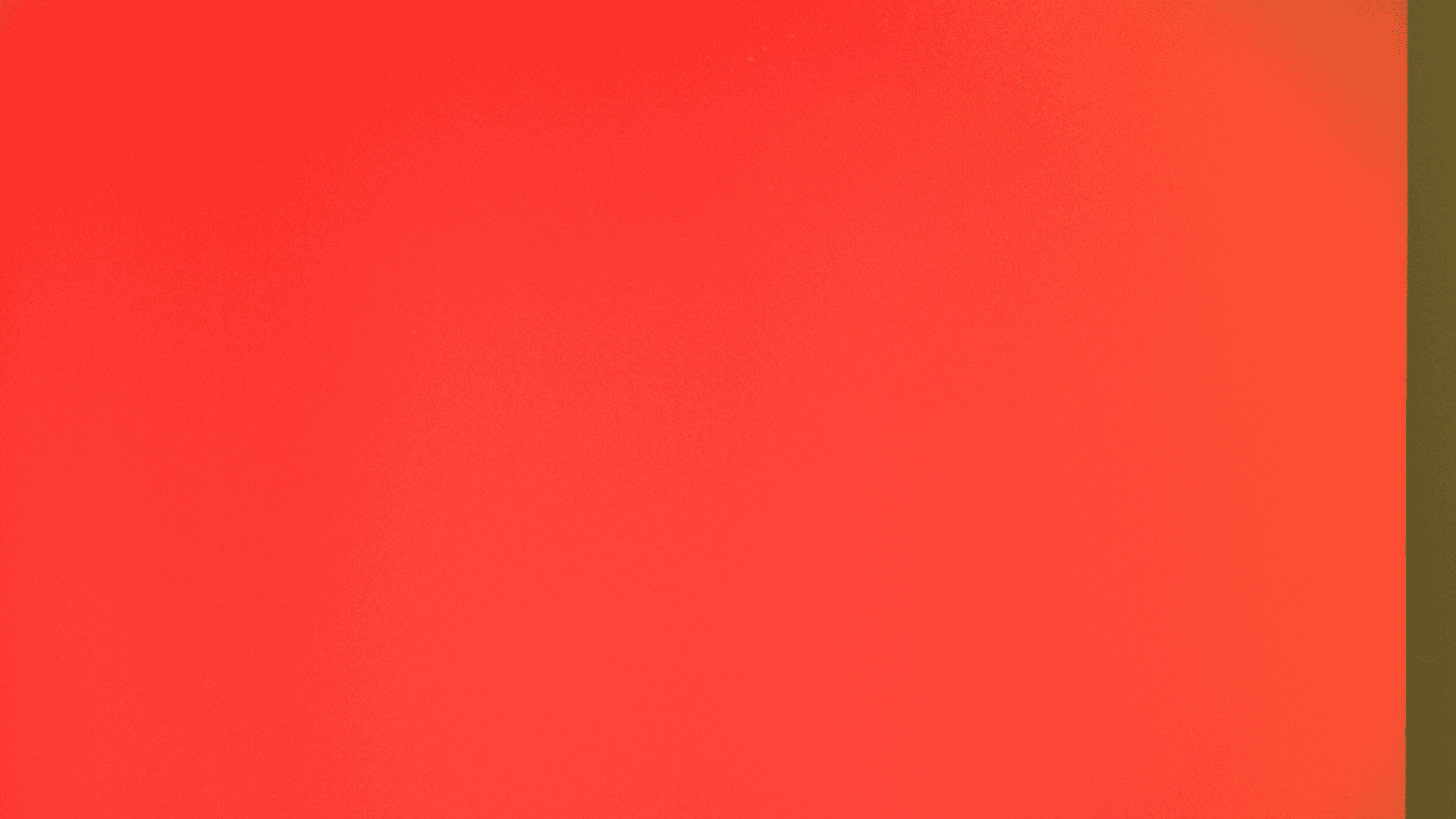 a red light is shown on a wall Background — A gradient of warm reds transitioning to orange with a thin olive green vertical strip on the right.