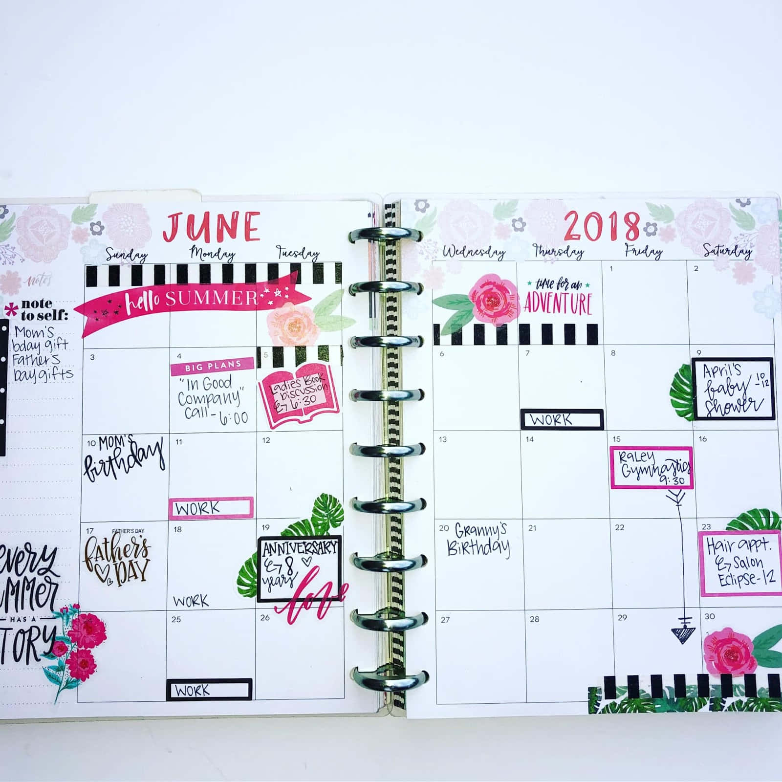 A Planner With A Floral Design And Stickers