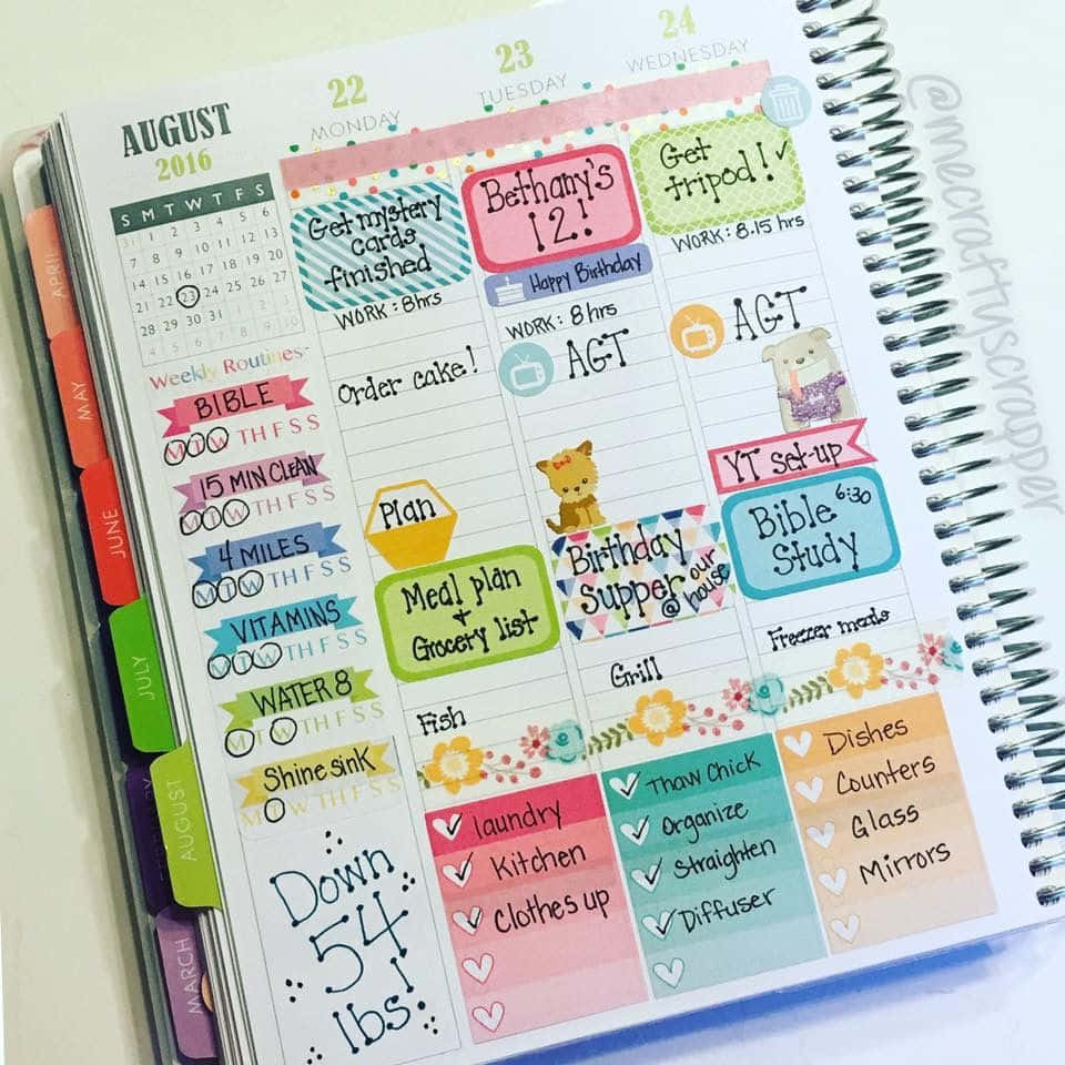 A Planner With Stickers And A Planner