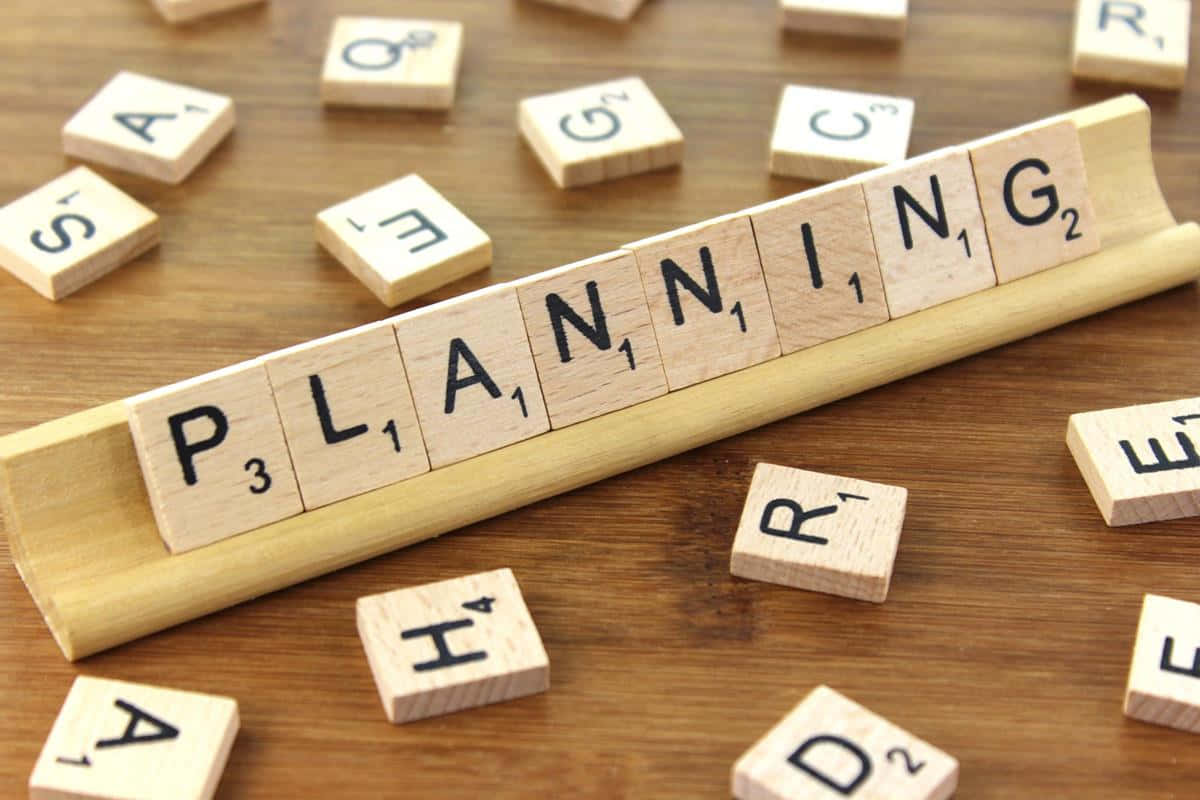 Planning - A Wooden Block With The Word Planning