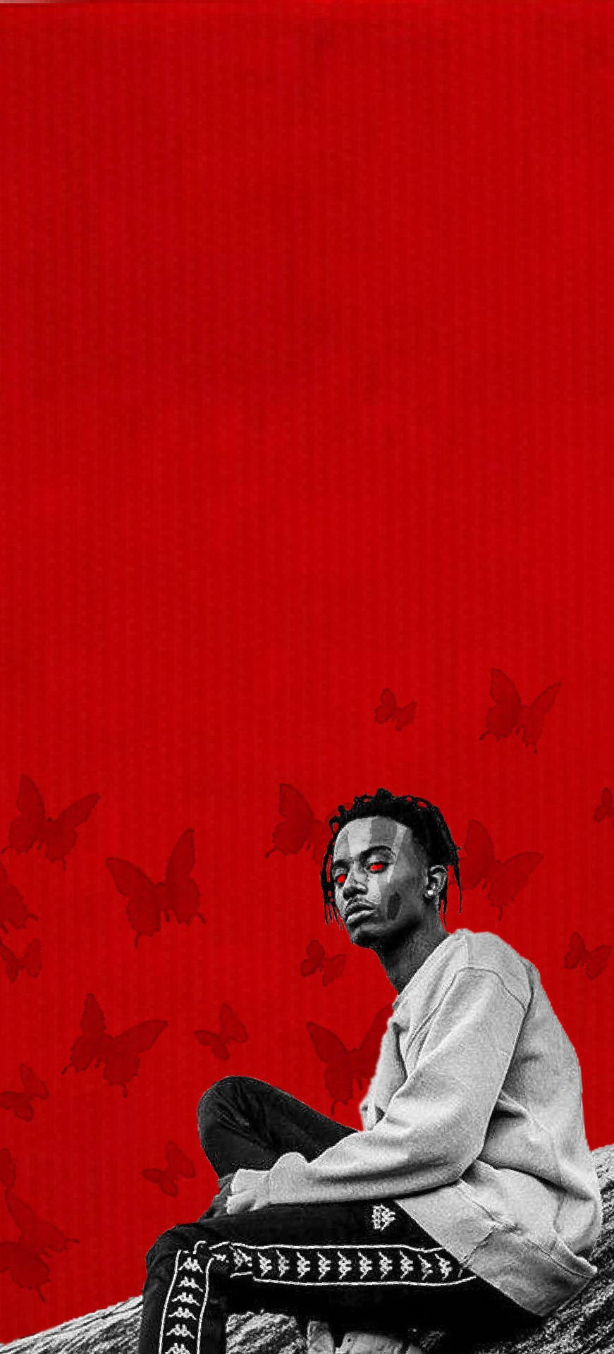 Playboi Carti looks angelic as red butterflies surround him Wallpaper