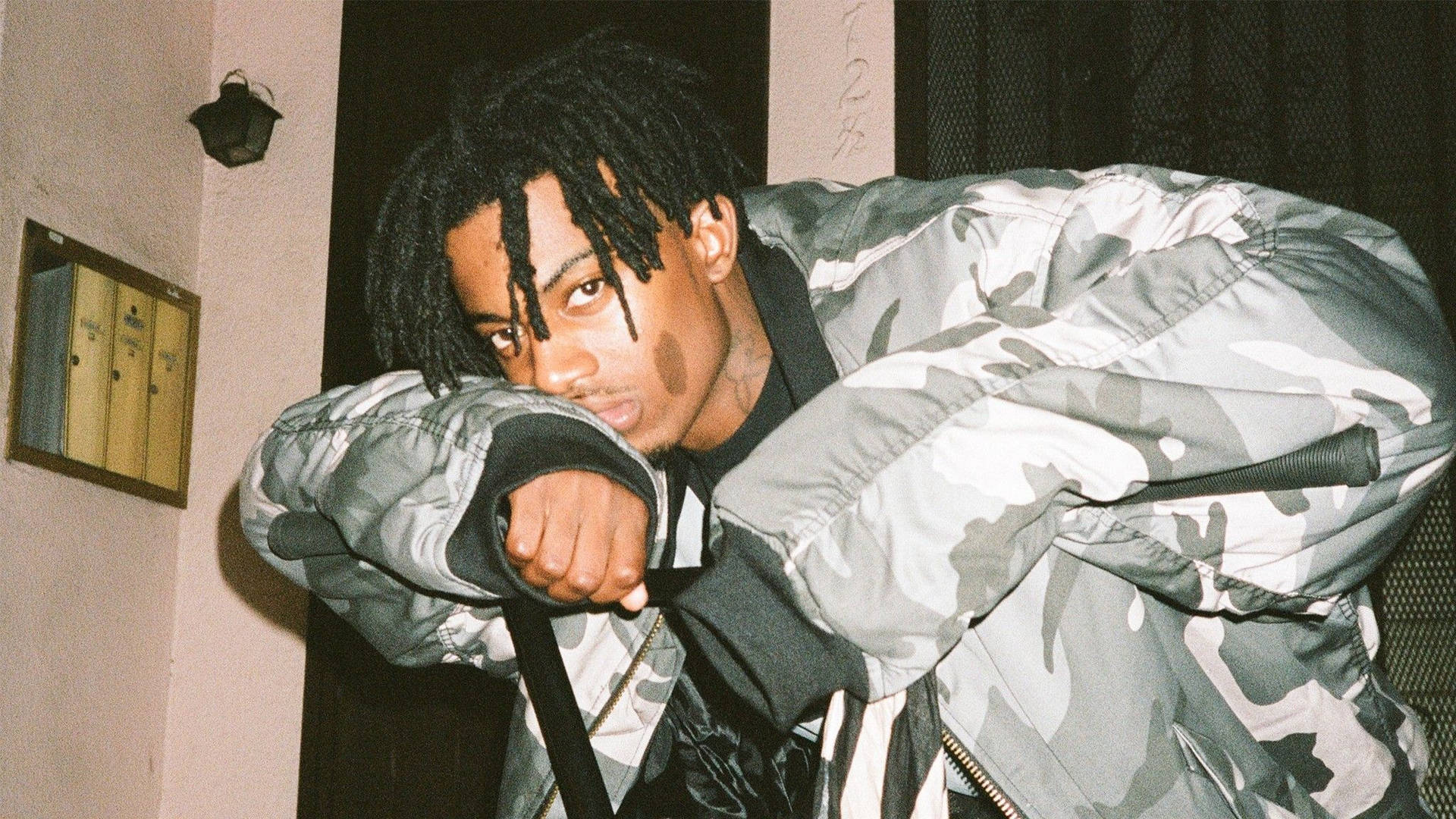 Playboi Carti looking cool and laid back. Wallpaper