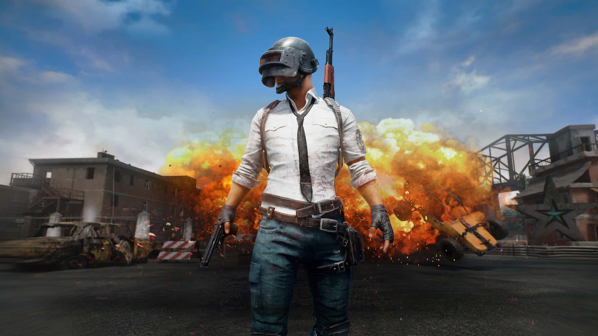 Pubg Mobile - A Man In A Helmet And A Helmet Standing In Front Of A Fire Wallpaper