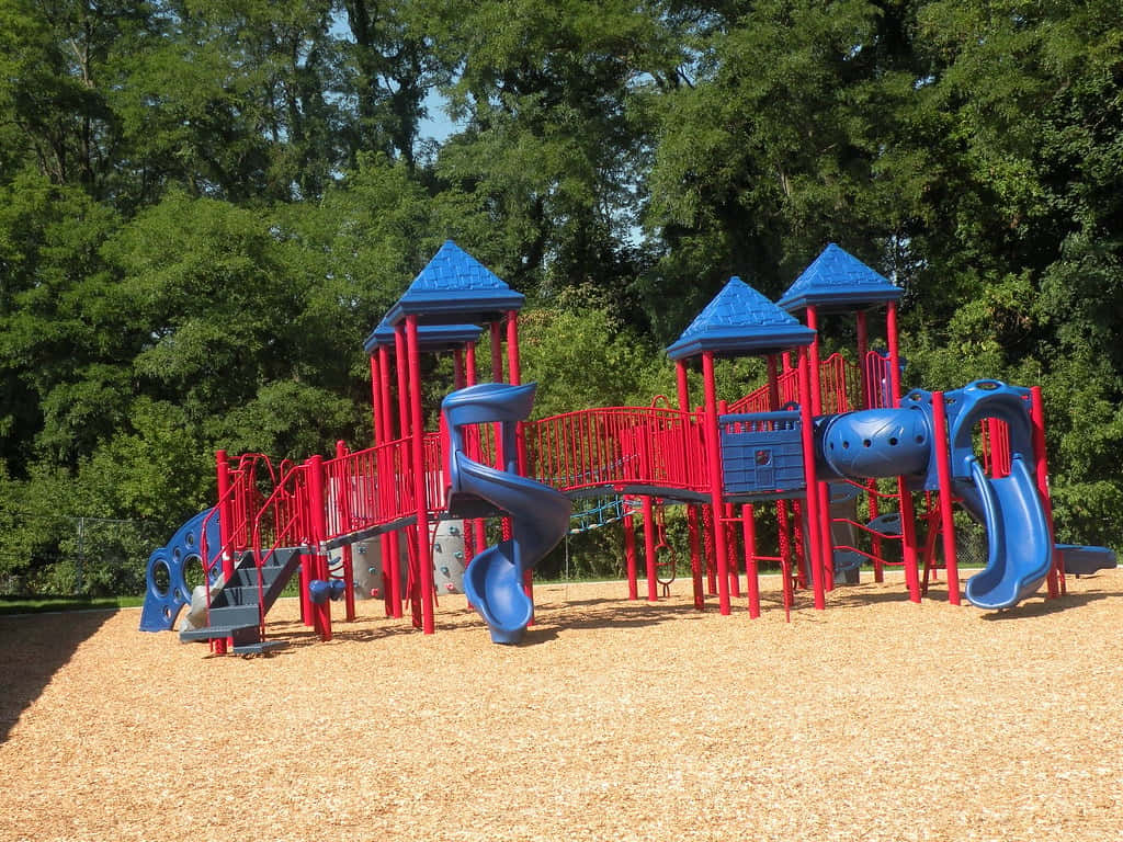Children playing at a colorful playground