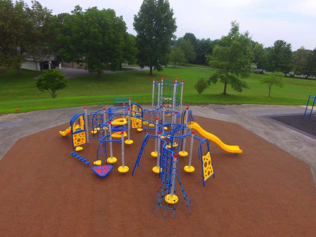 Kids playground with colorful slides and climbing structures