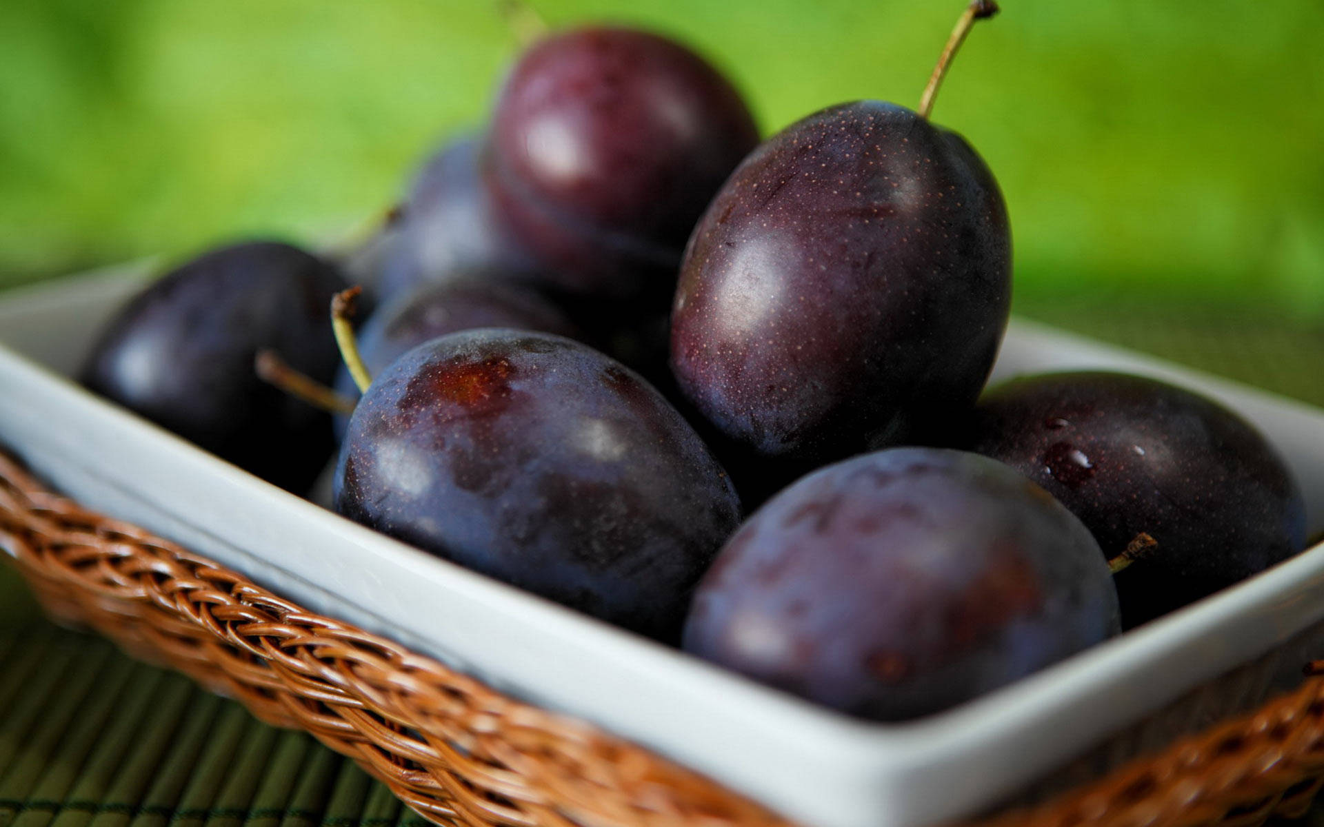 Plum Fruits With Plump Round Bodies Wallpaper