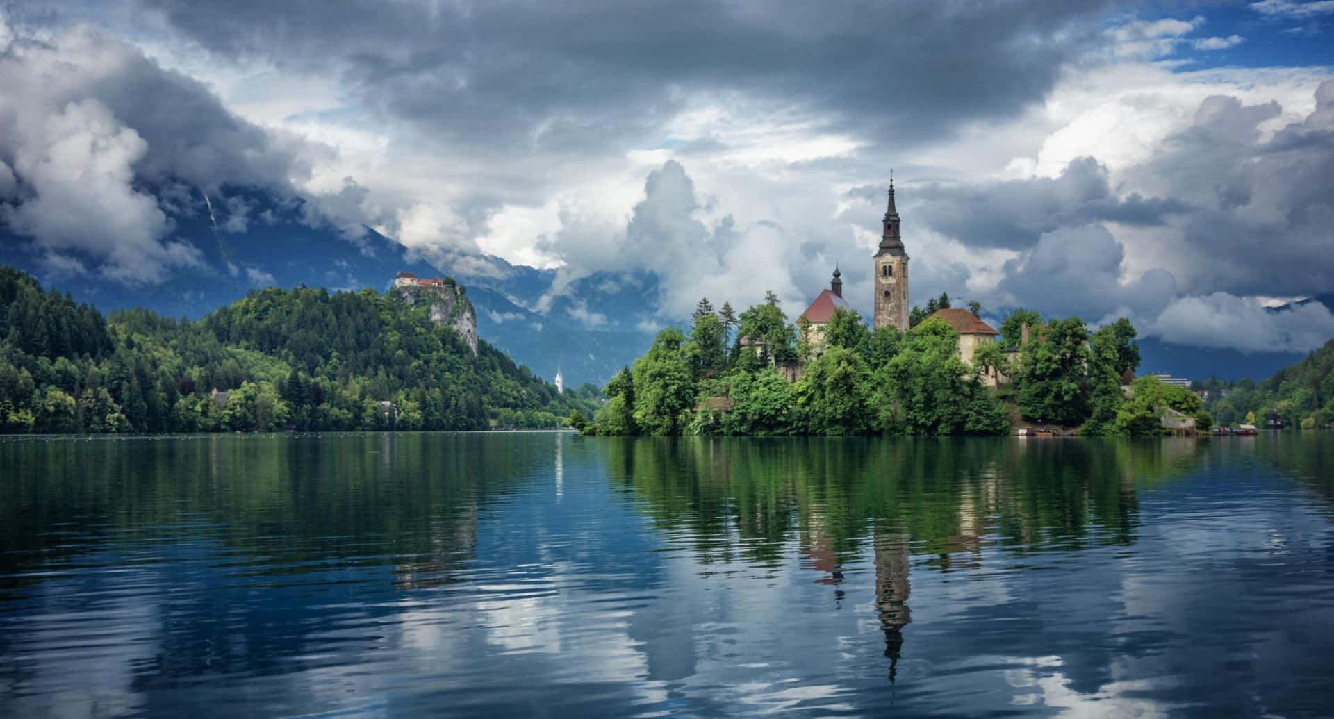 Plump Clouds Above Lake Bled Wallpaper