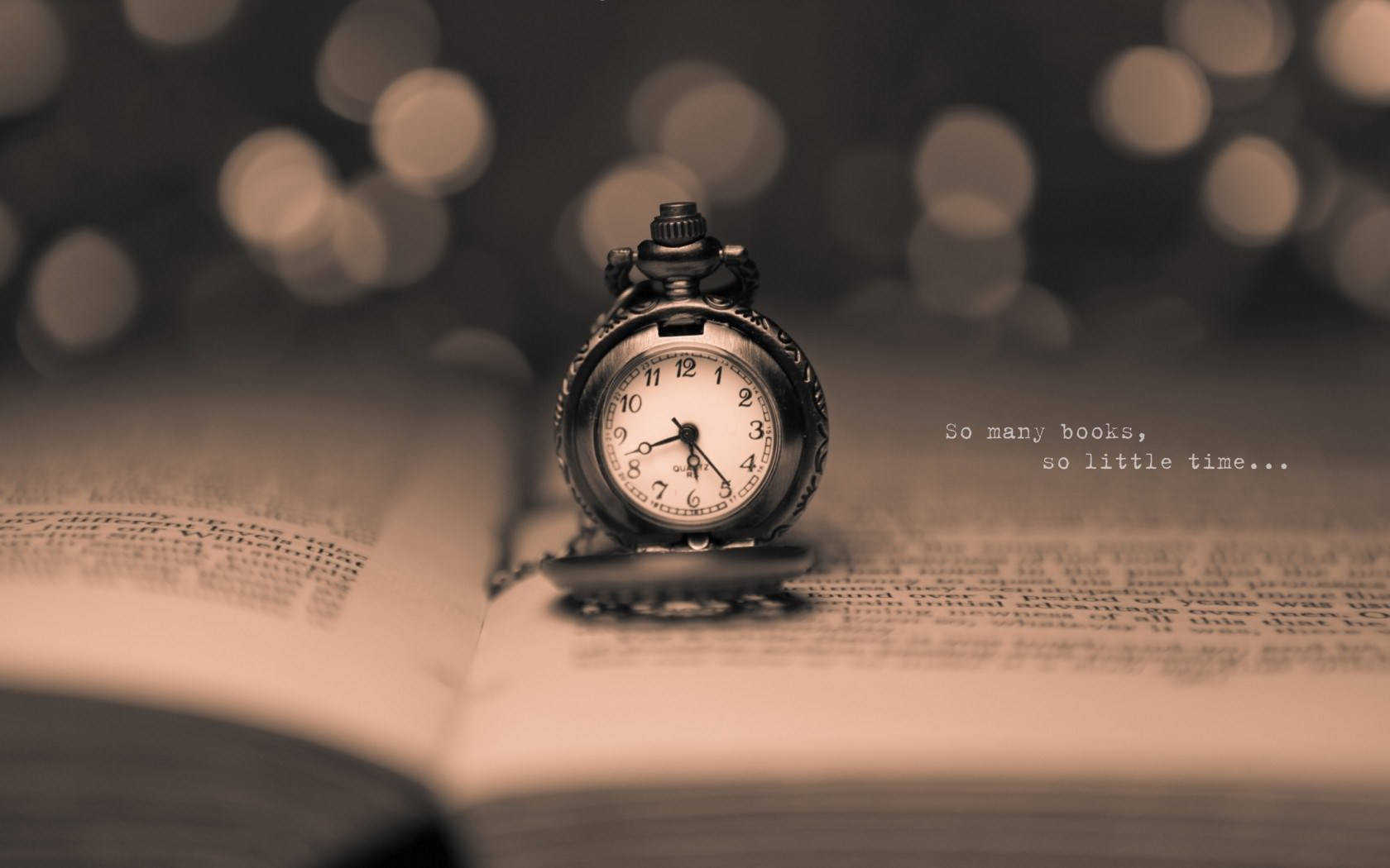 Pocketwatch standing on an open book with a quote wallpaper