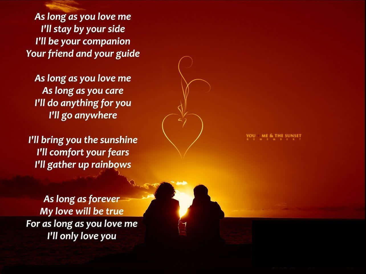 A Poem With Two People Sitting On The Beach Wallpaper