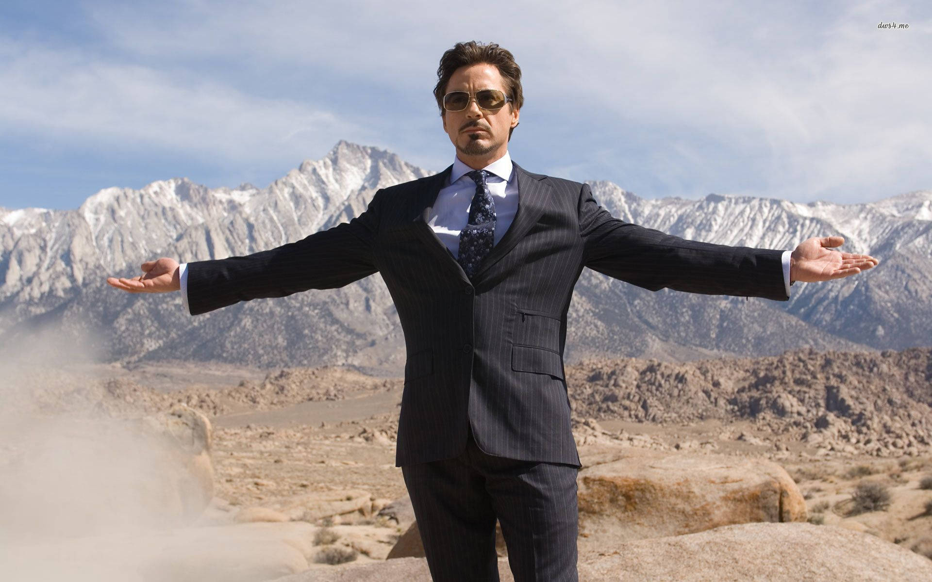 Poised Robert Downey Jr. Tony Stark Background