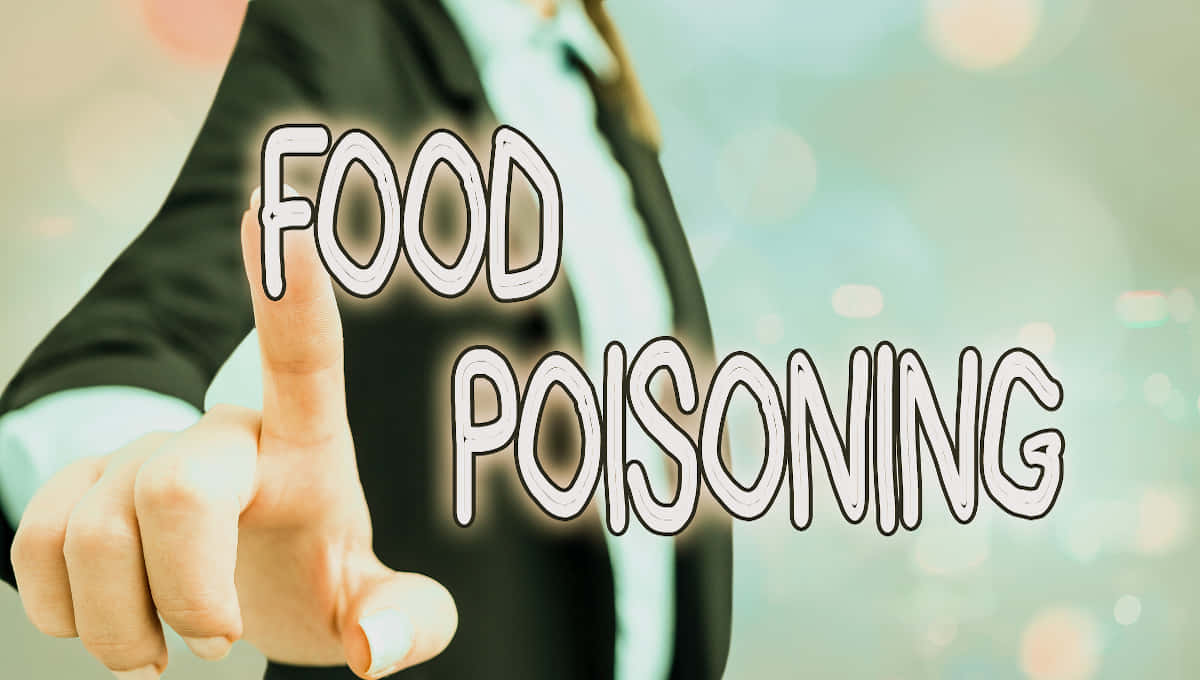 A Woman Is Pointing At The Word Food Poisoning