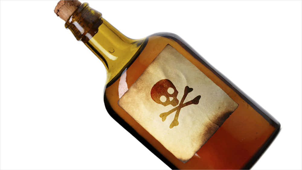 A Bottle Of Whiskey With A Skull And Crossbones On It