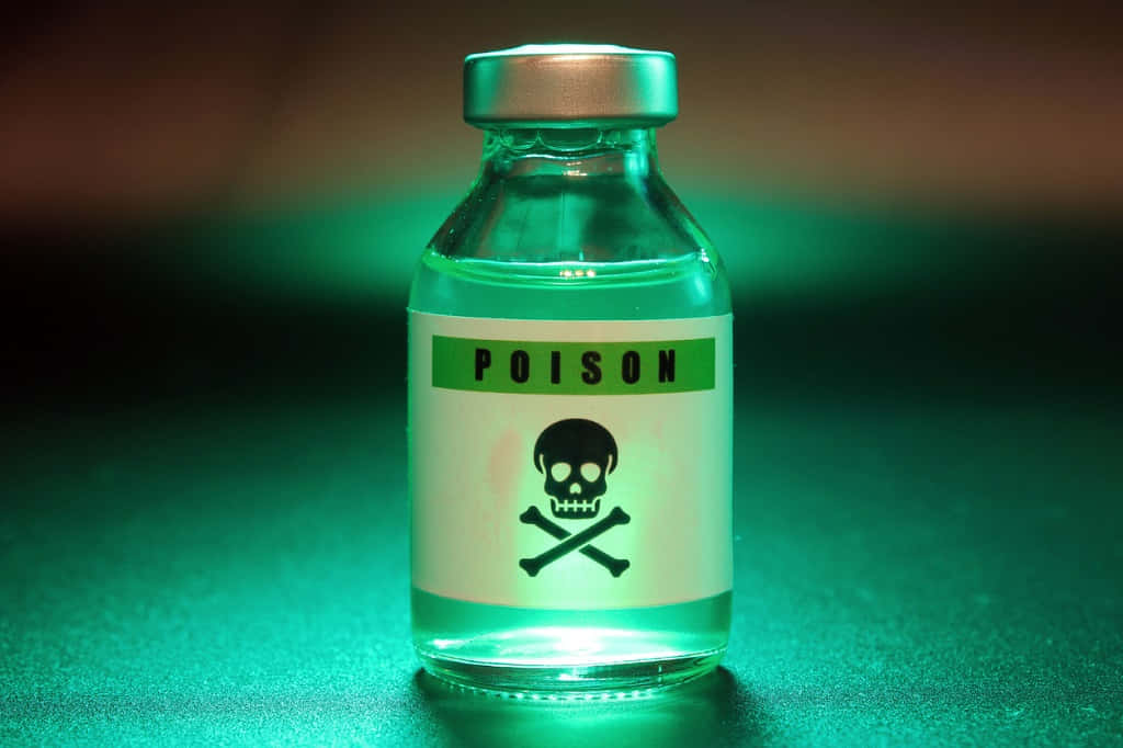 A Bottle Of Poison With A Skull And Crossbones On It