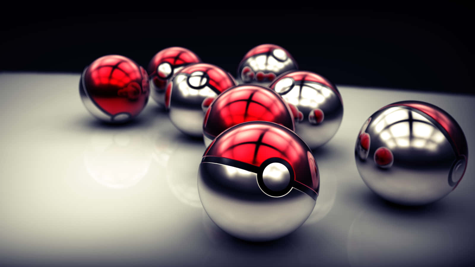 Pokemon Spheres In A Row On A White Surface
