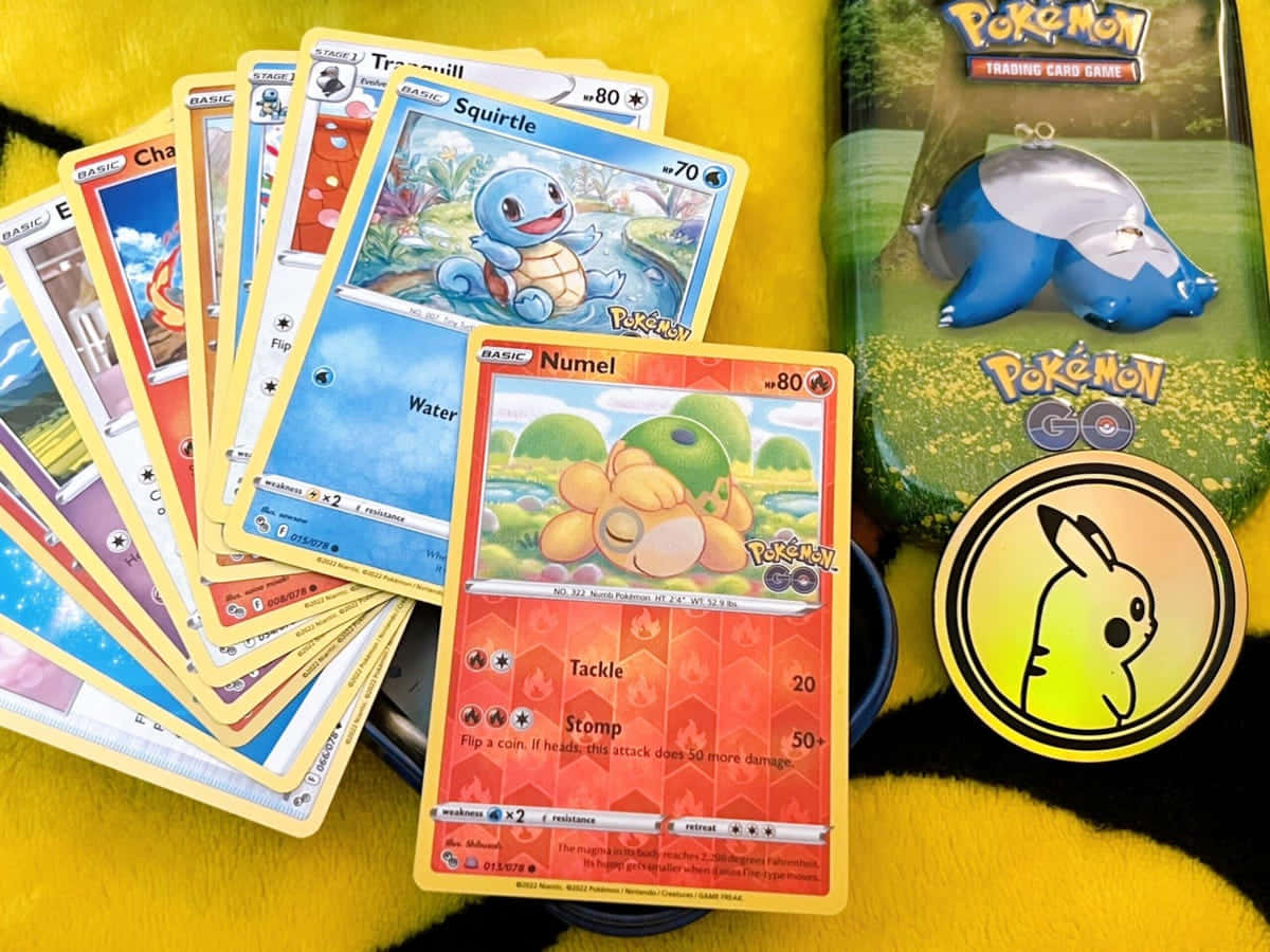 Pokemon Cards And A Box Of Cards