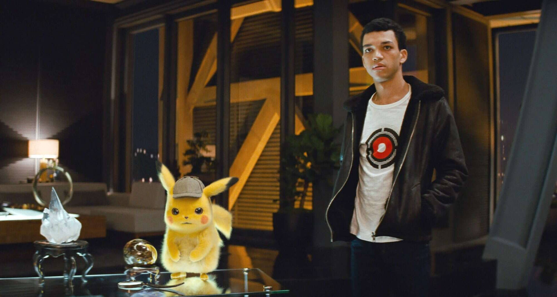 Pokemon Detective Pikachu With Justice Smith Wallpaper