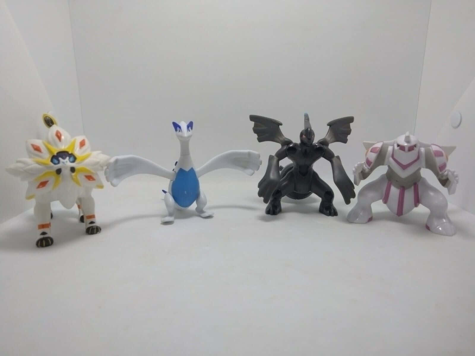 Collection of Classic and Modern Pokemon Figures Wallpaper