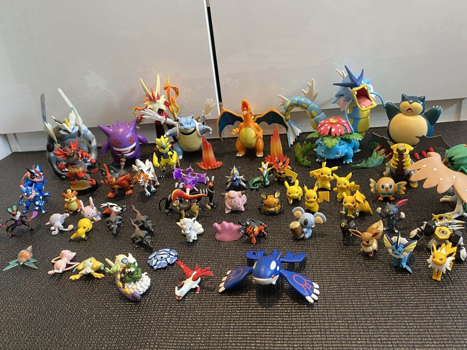 Showcase of Colorful Pokemon Figures Wallpaper