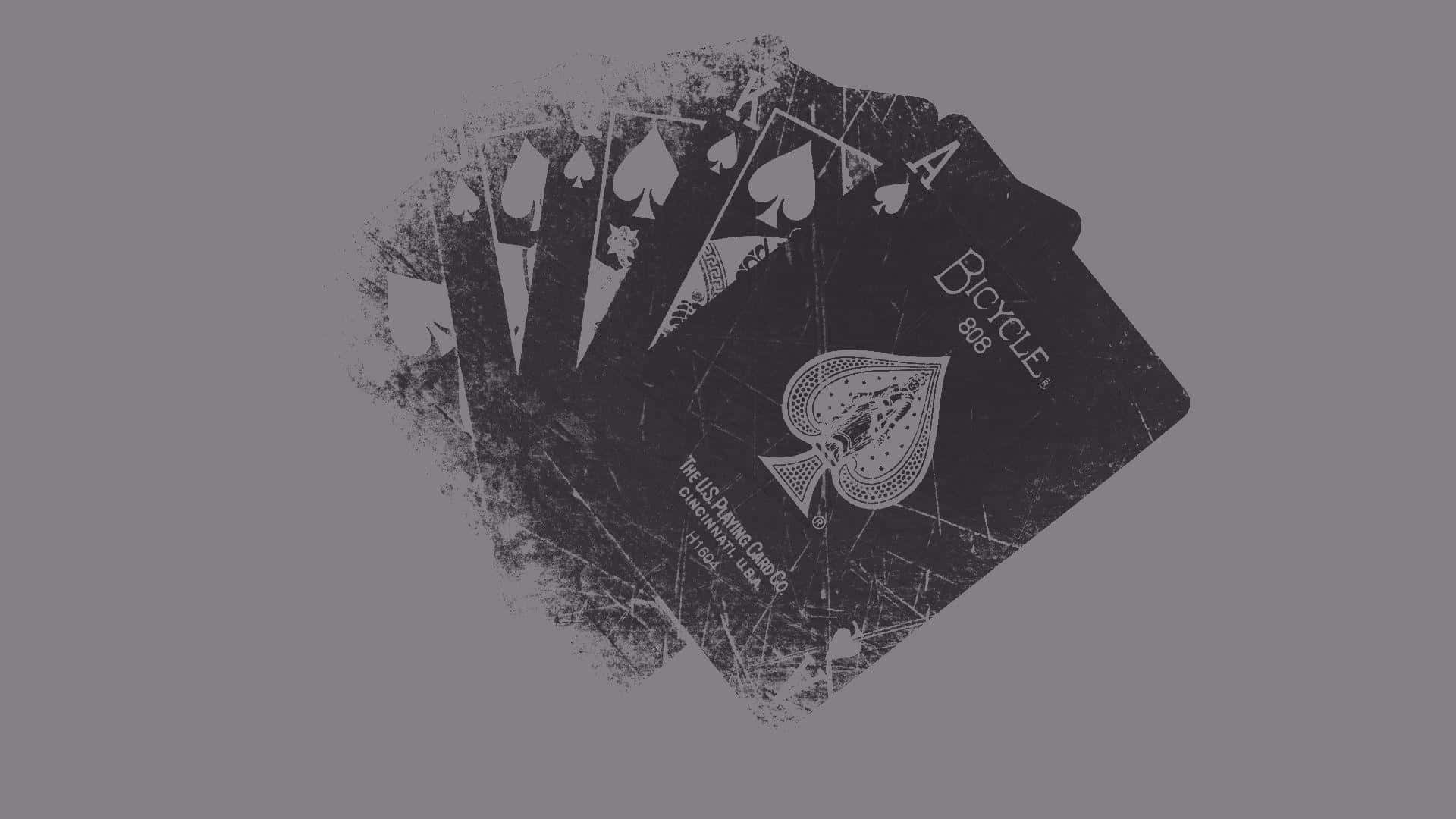 A Black And White Image Of Playing Cards