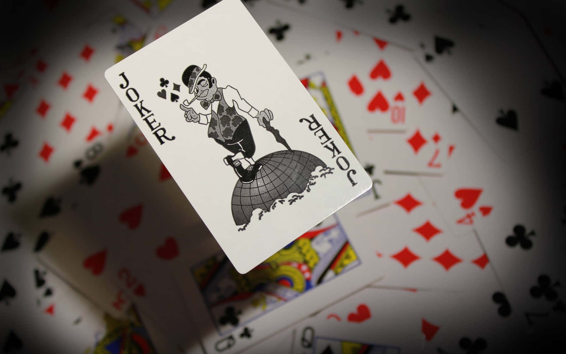 A Woman Is Holding A Deck Of Playing Cards