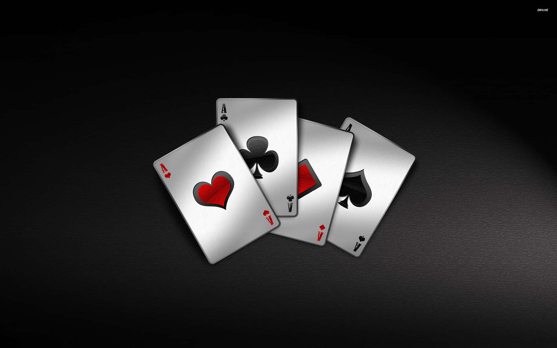 A Black Background With Playing Cards On It