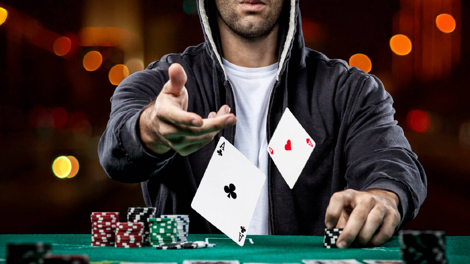 Poker Player Showing Pair Of Aces In Baccarat Game Wallpaper