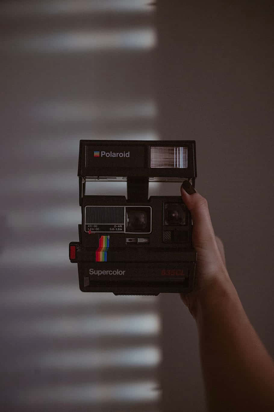 Vintage Polaroid Camera Capturing Moments