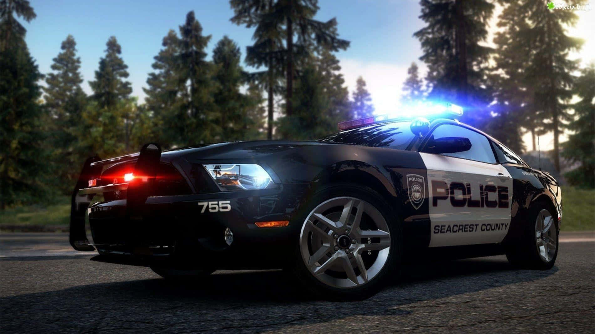 A Police Car Driving Down A Road In A Game