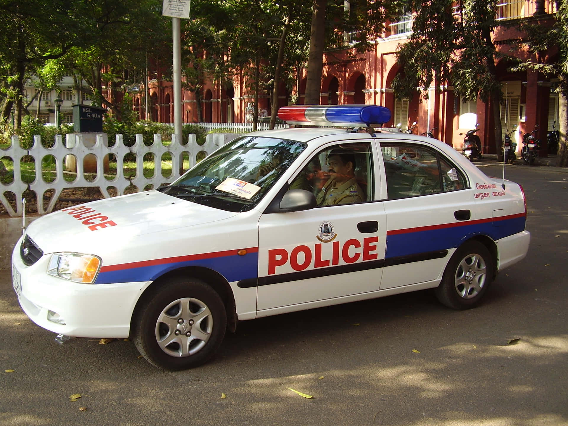 A Police Car Patrolling the City Streets