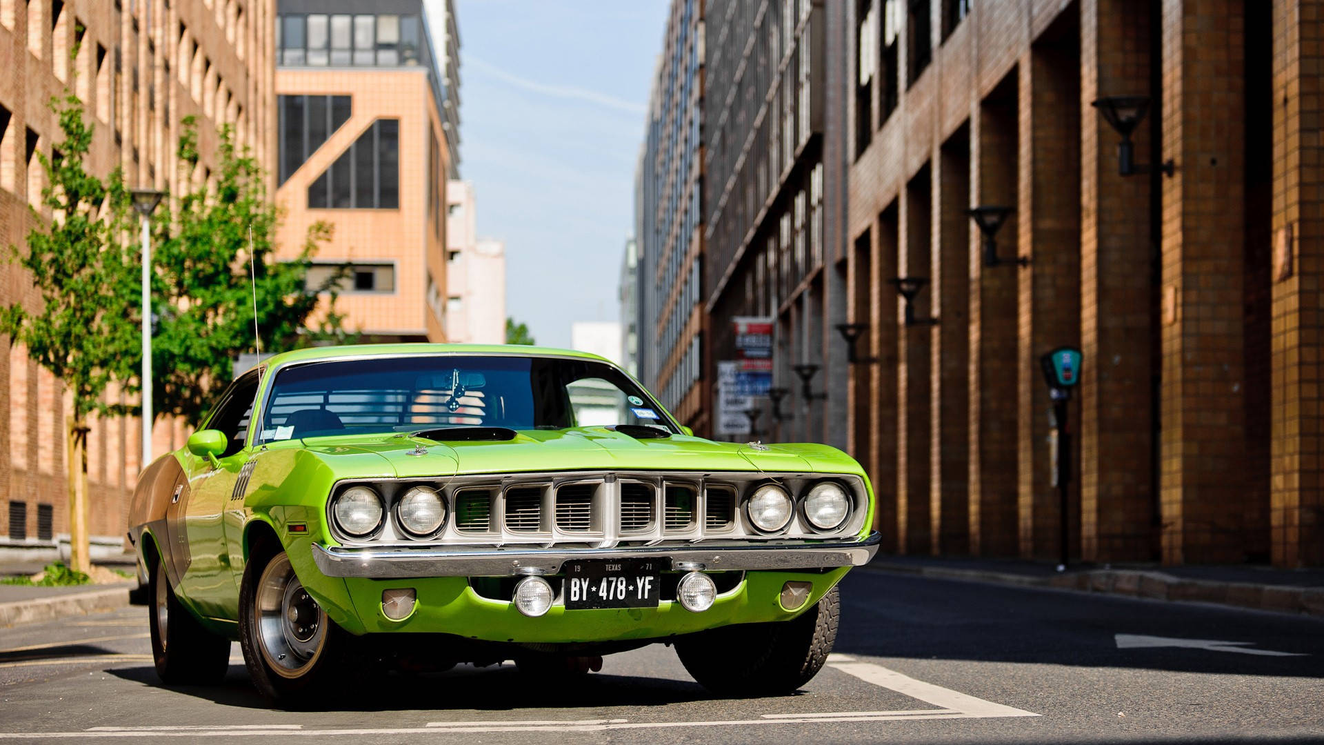 Polished Plymouth Barracuda In Green Color Wallpaper