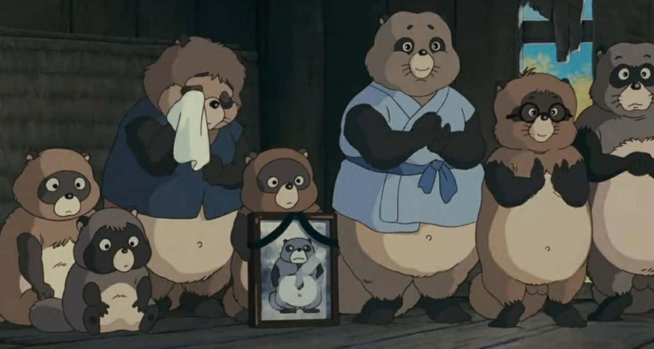 A group of fun-loving tanuki from Pom Poko in their fantastical world Wallpaper