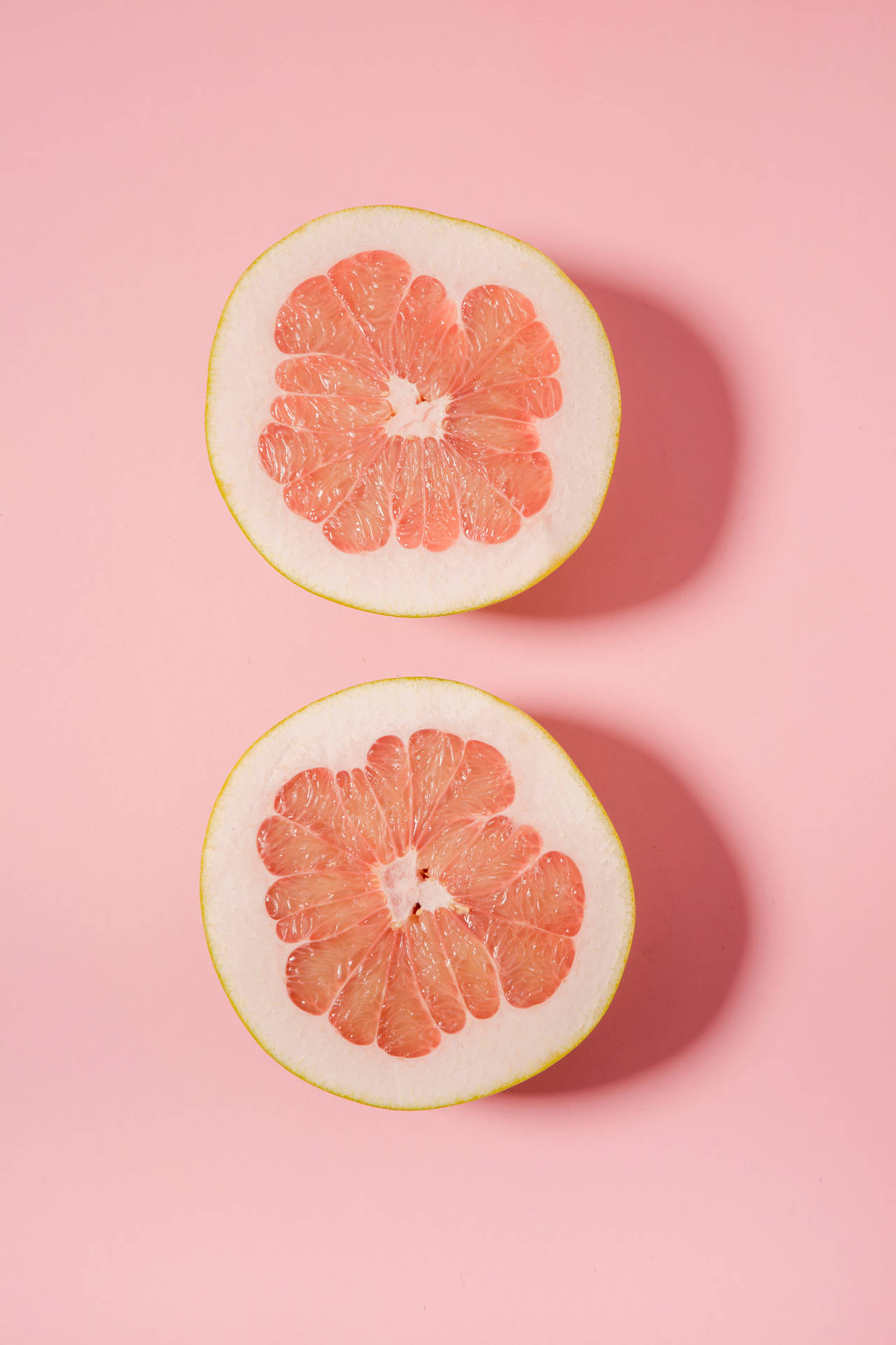 Pomelo On Pink Background Wallpaper