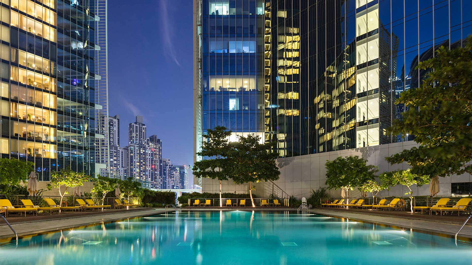 Pool In Downtown Dubai At Night Wallpaper
