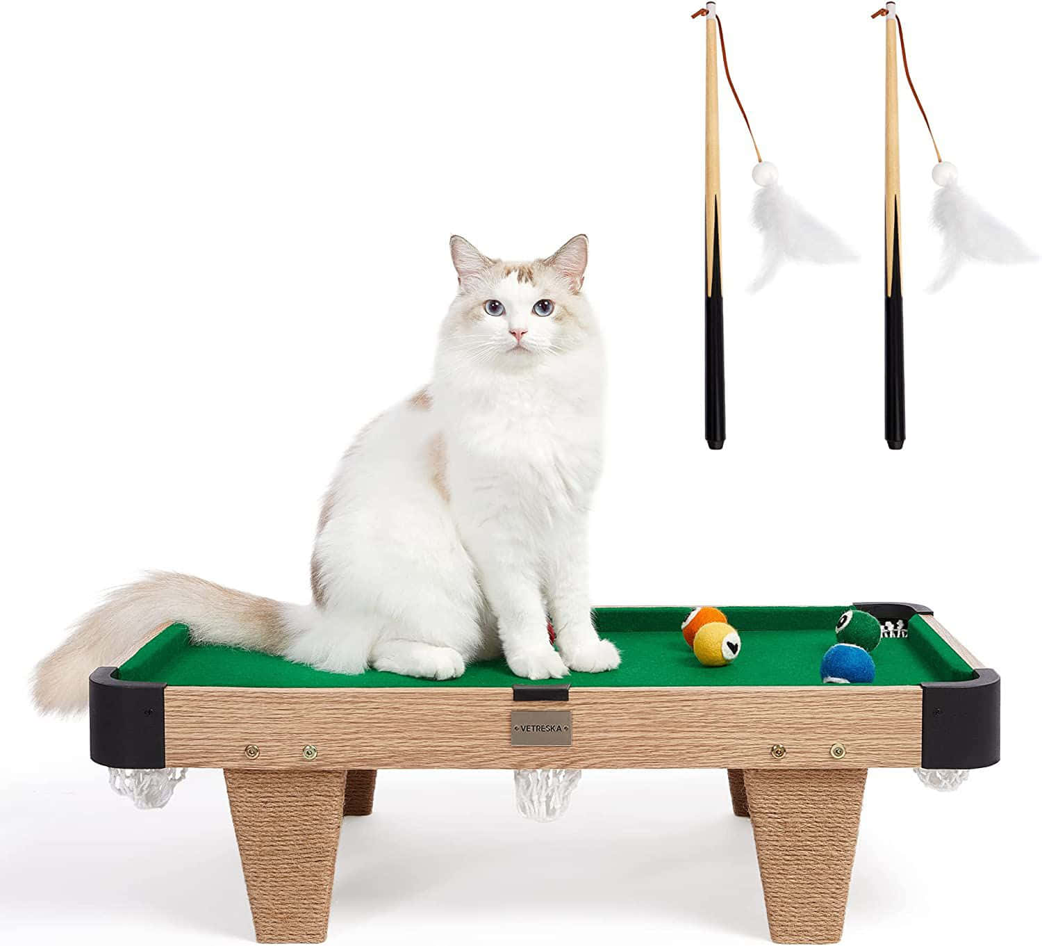 A Cat Sitting On A Pool Table With A Ball And A Stick