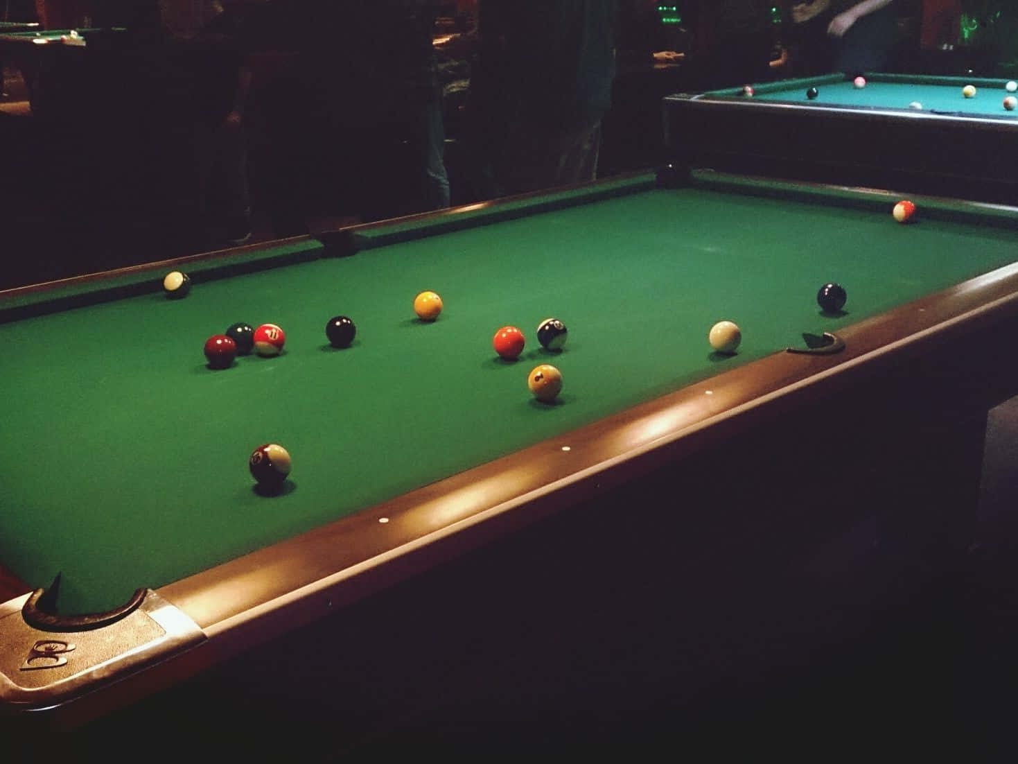 A Pool Table With Balls