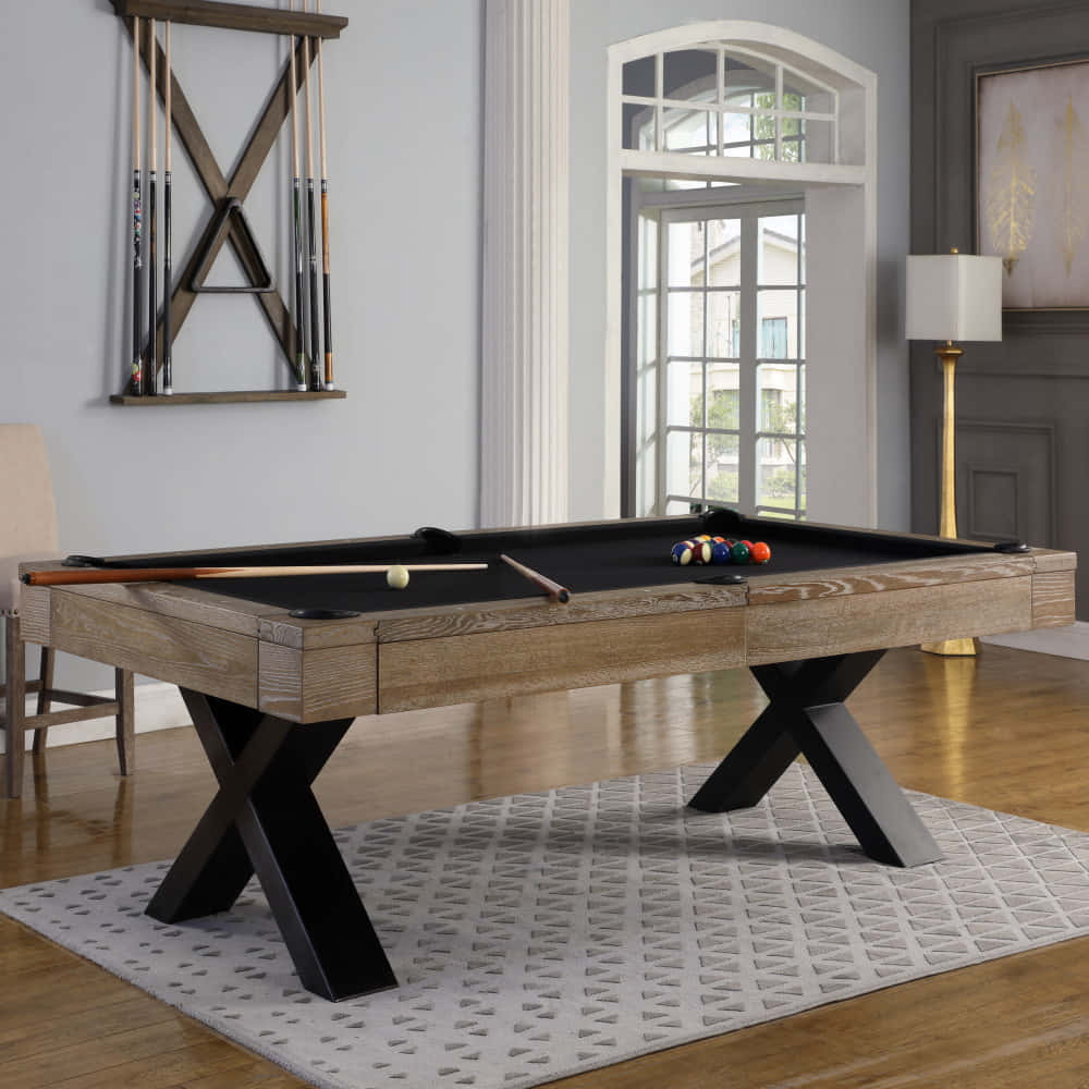 A Pool Table With A Black And Wood Frame