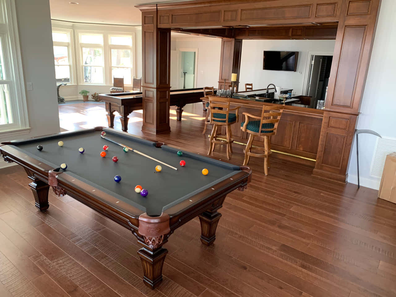 A Pool Table In A Living Room