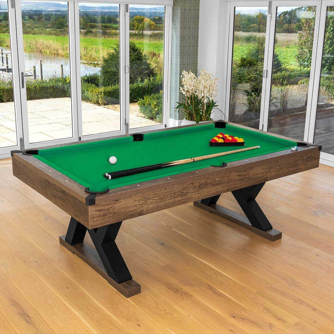 A Pool Table With A Green Cloth And A Ball