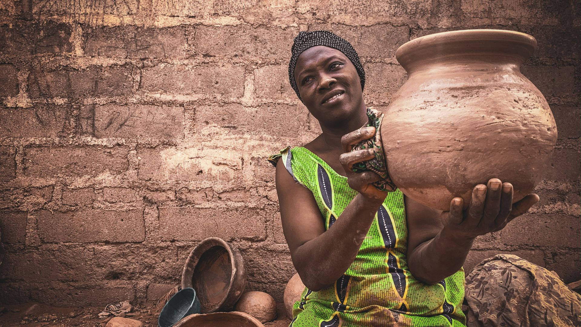Poor African Woman Holding Jar Picture