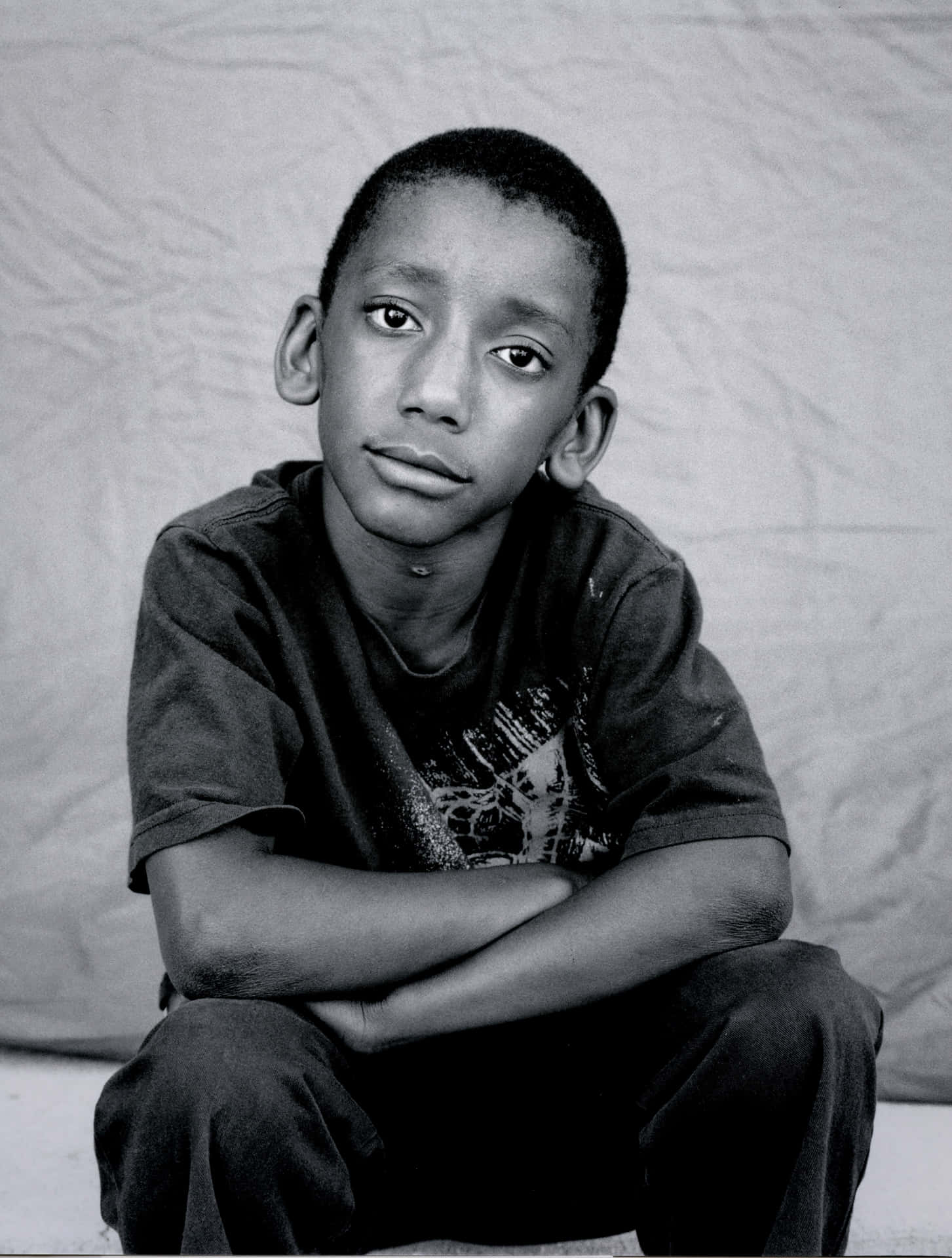 Download Poor Kid Black And White Portrait Wallpaper | Wallpapers.com