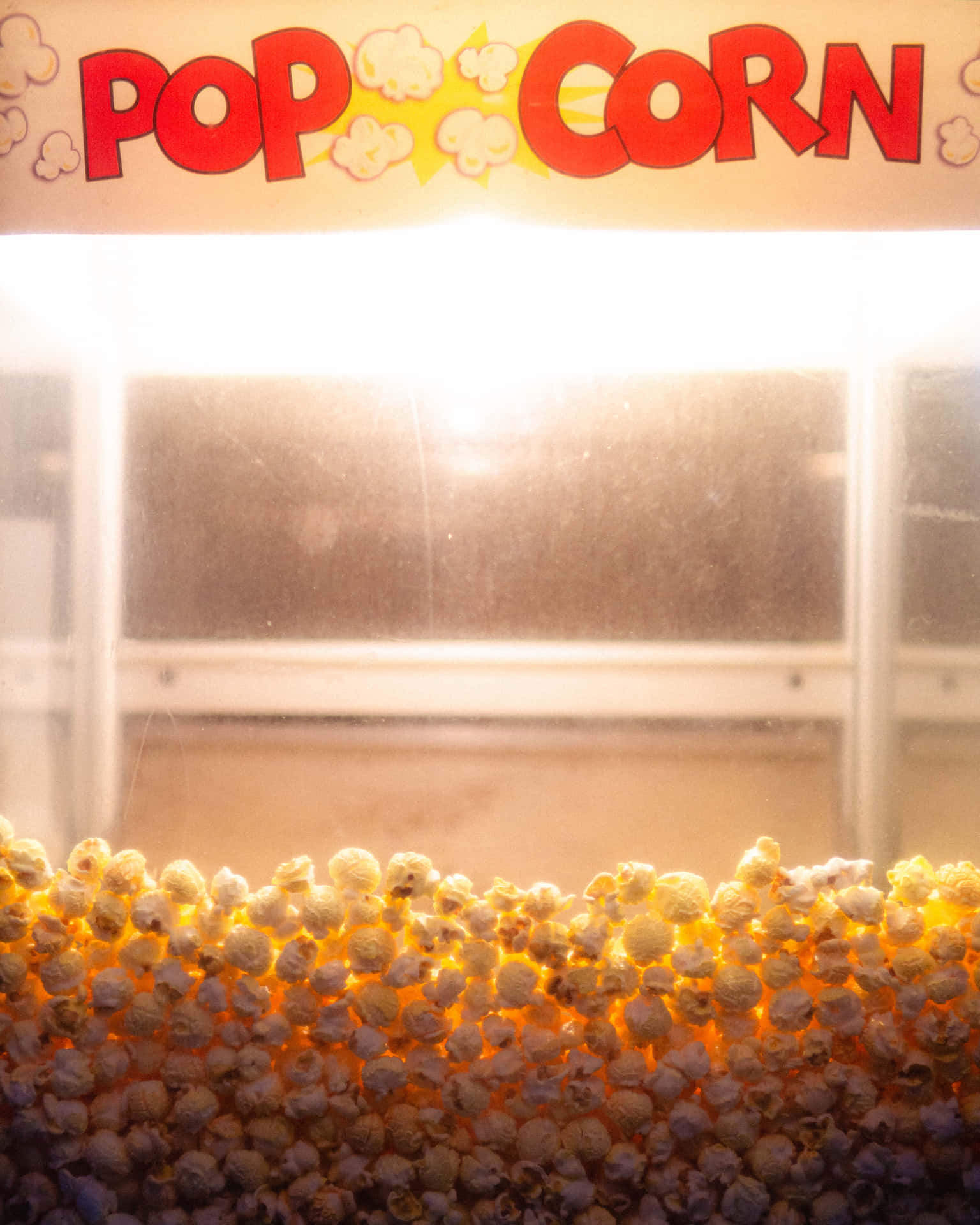 A Popcorn Machine With Popcorn Inside