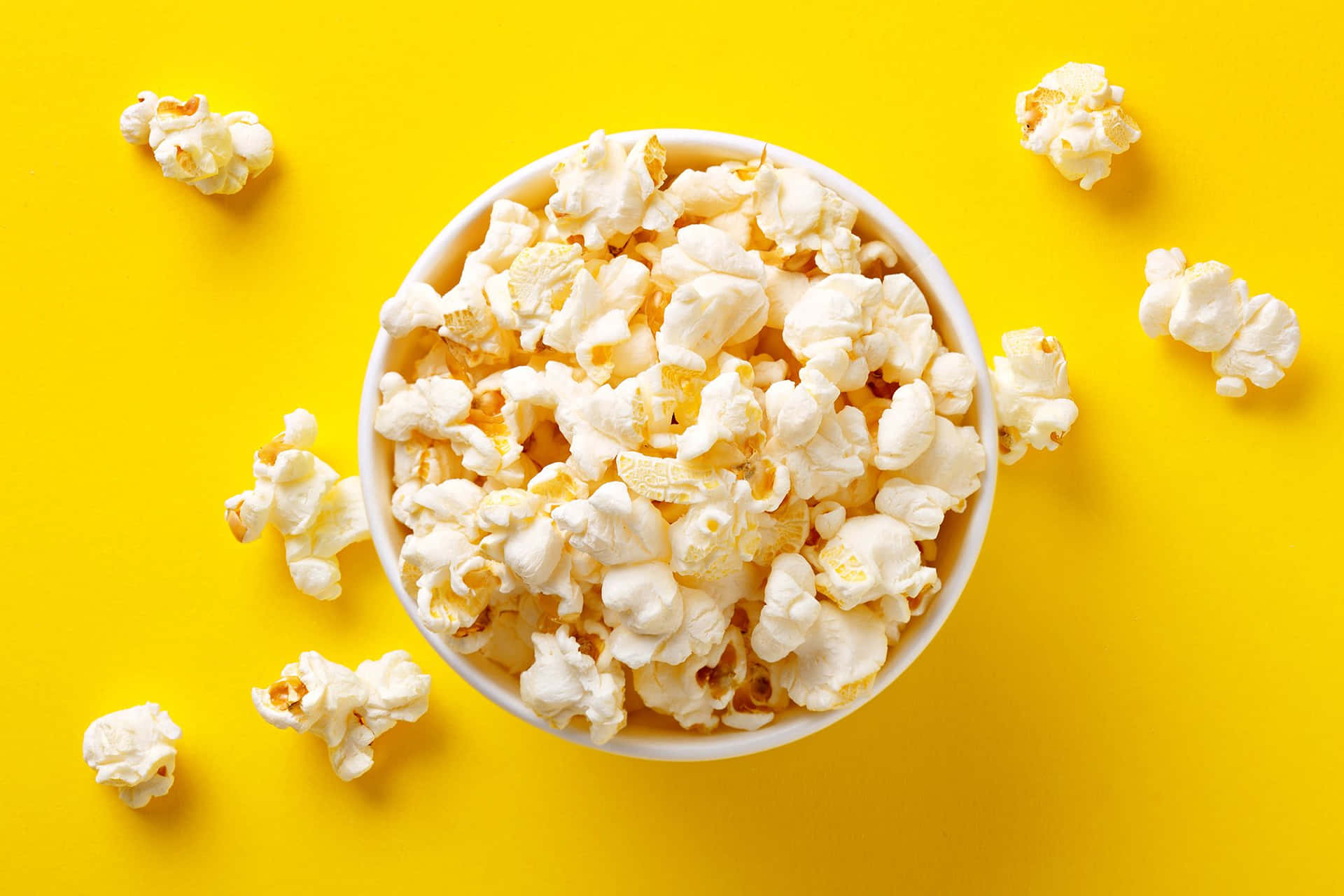 Popcorn On Yellow Surface Picture