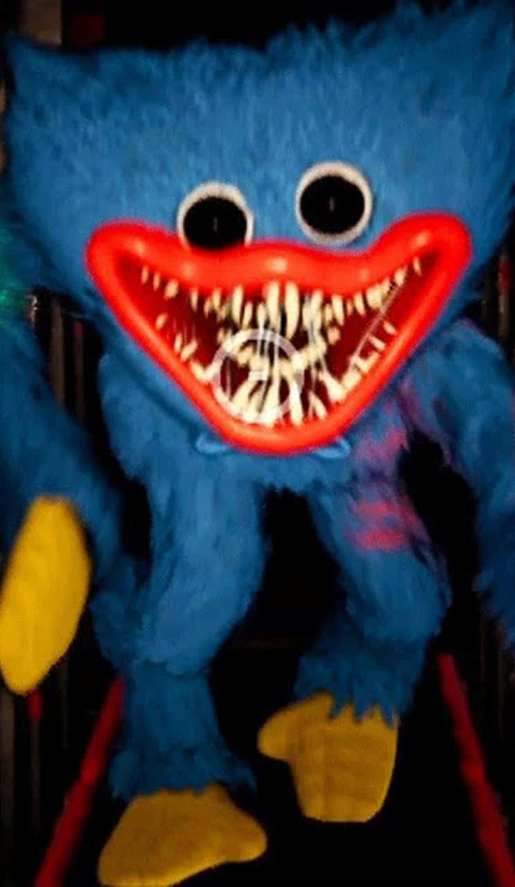 A Blue Monster With Big Teeth Standing In A Dark Room