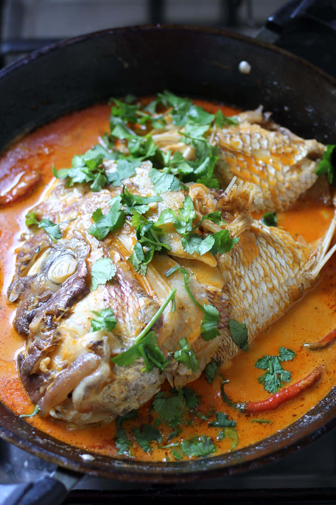 Popular Singaporean And Malaysian Dish Fish Head Curry Wallpaper