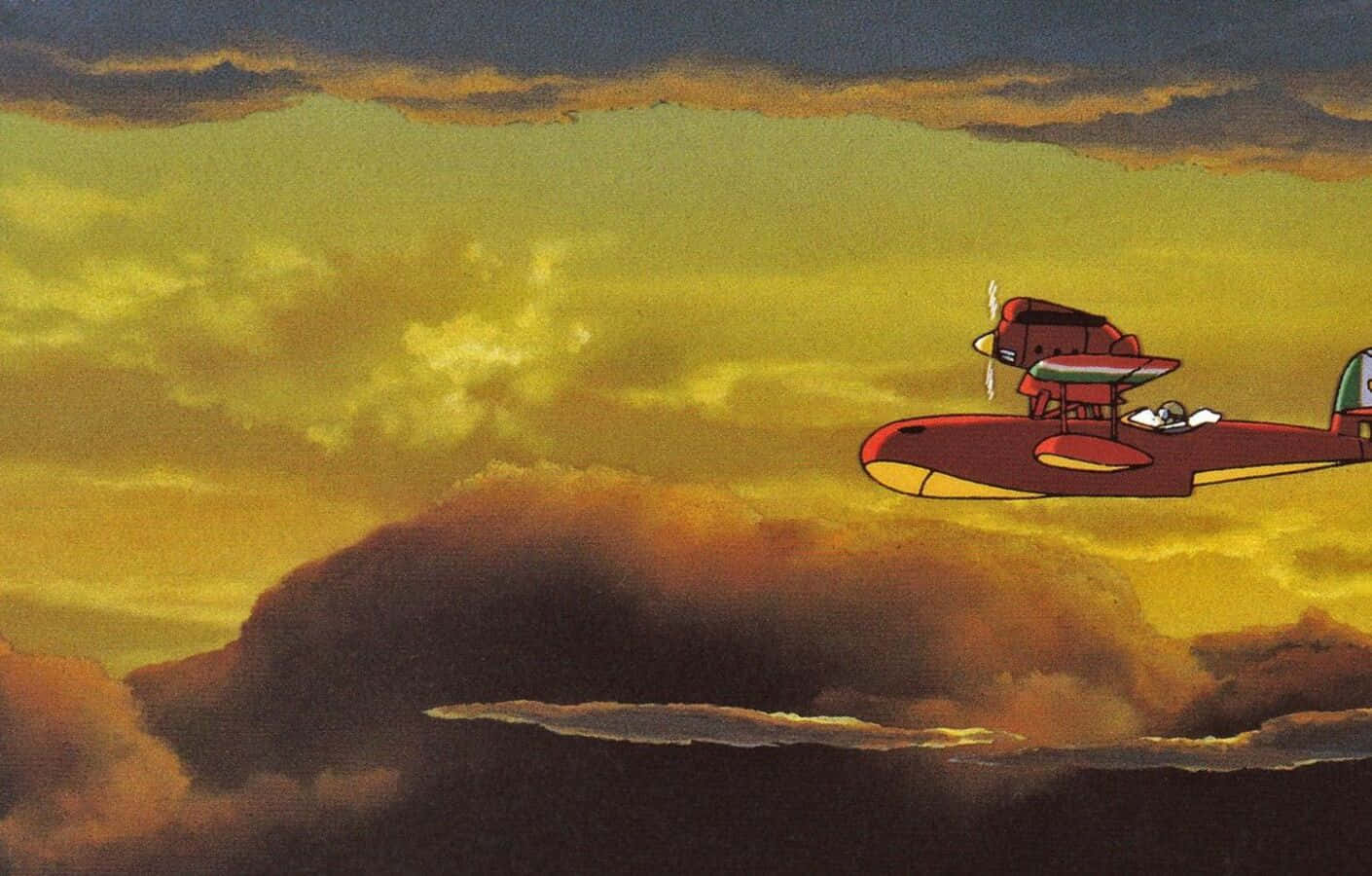 Porco Rosso soaring through the skies in his red seaplane Wallpaper