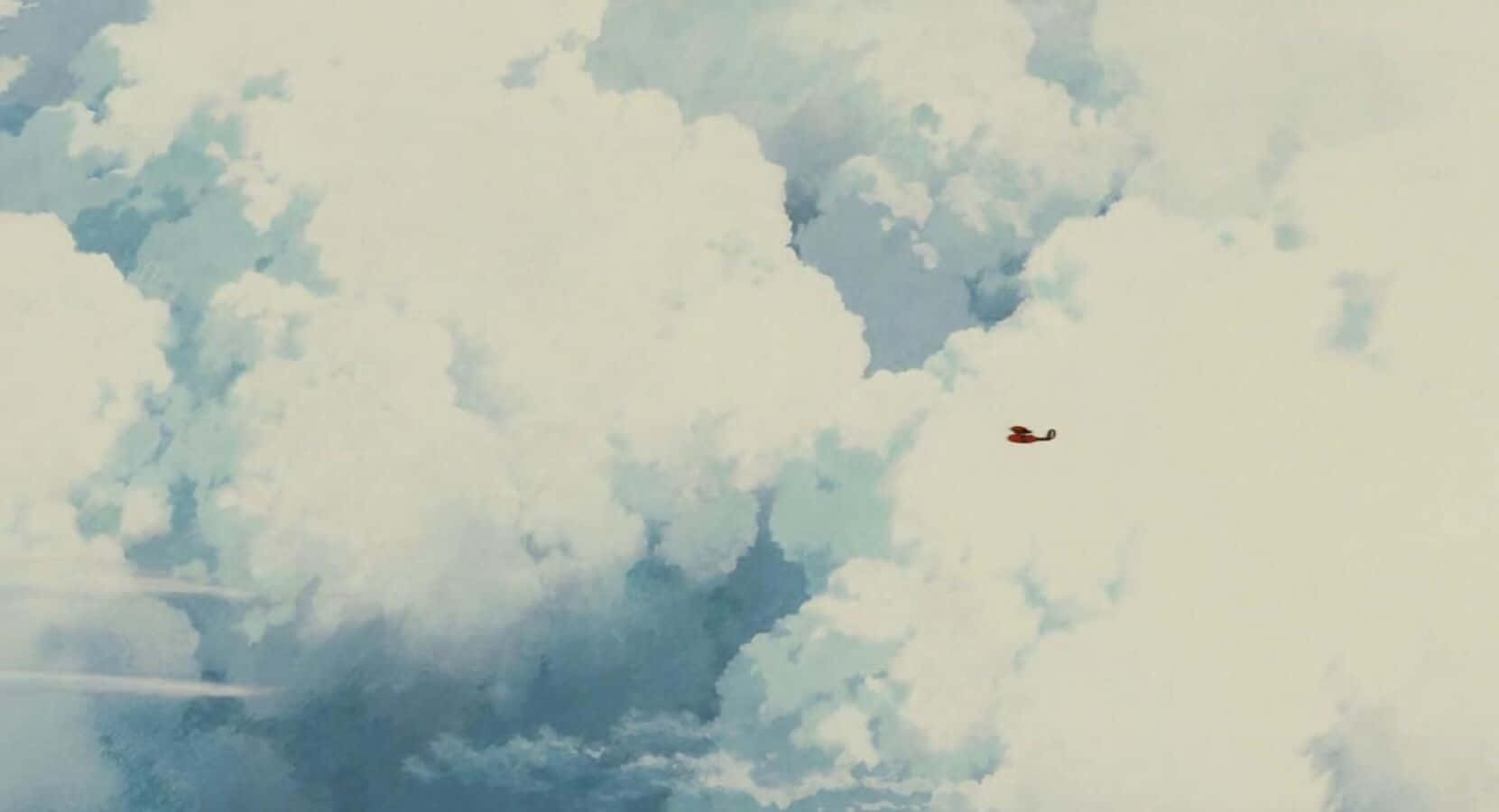Hidroaviónde Porco Rosso Surcando Los Cielos Sobre El Mar Fondo de pantalla