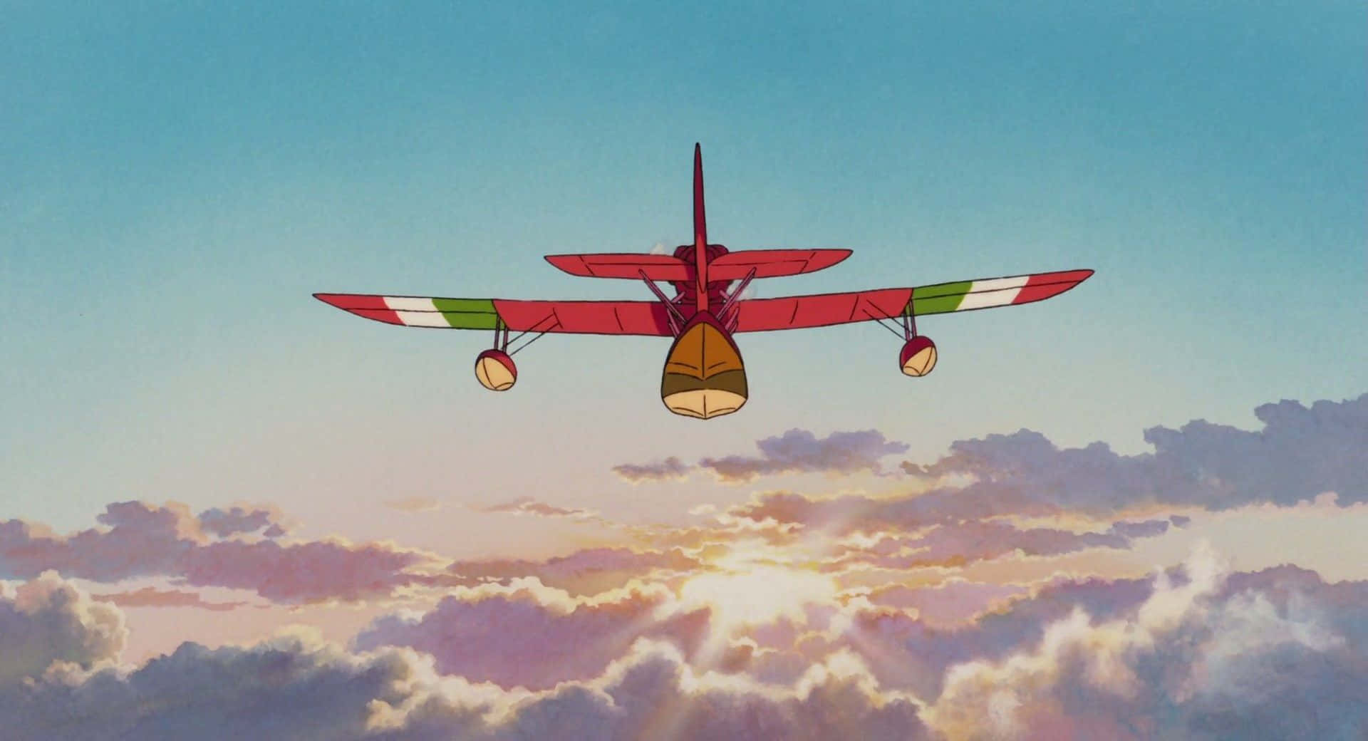 Porco Rosso flying over the ocean at sunset Wallpaper