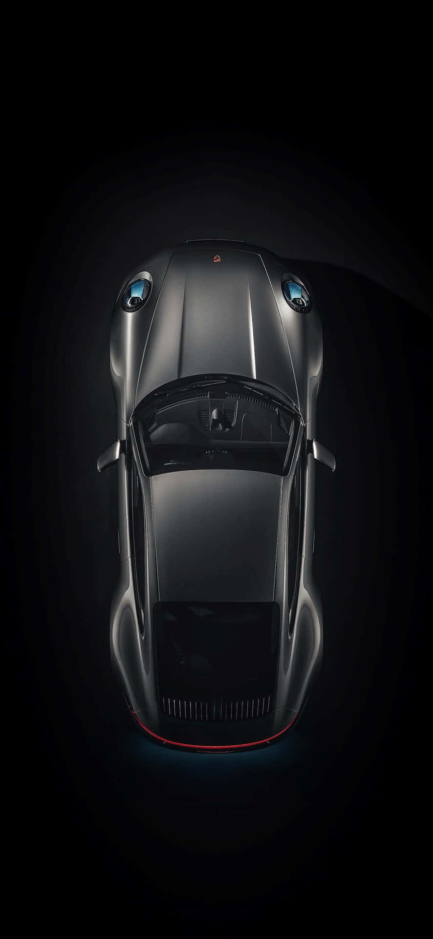 Sleek Black Porsche on the Go Wallpaper